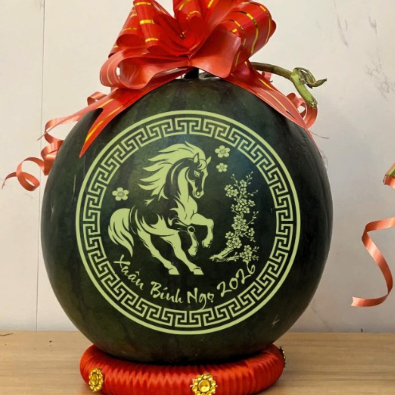 Khắc dưa Tết Xuân Bính Ngọ 2026